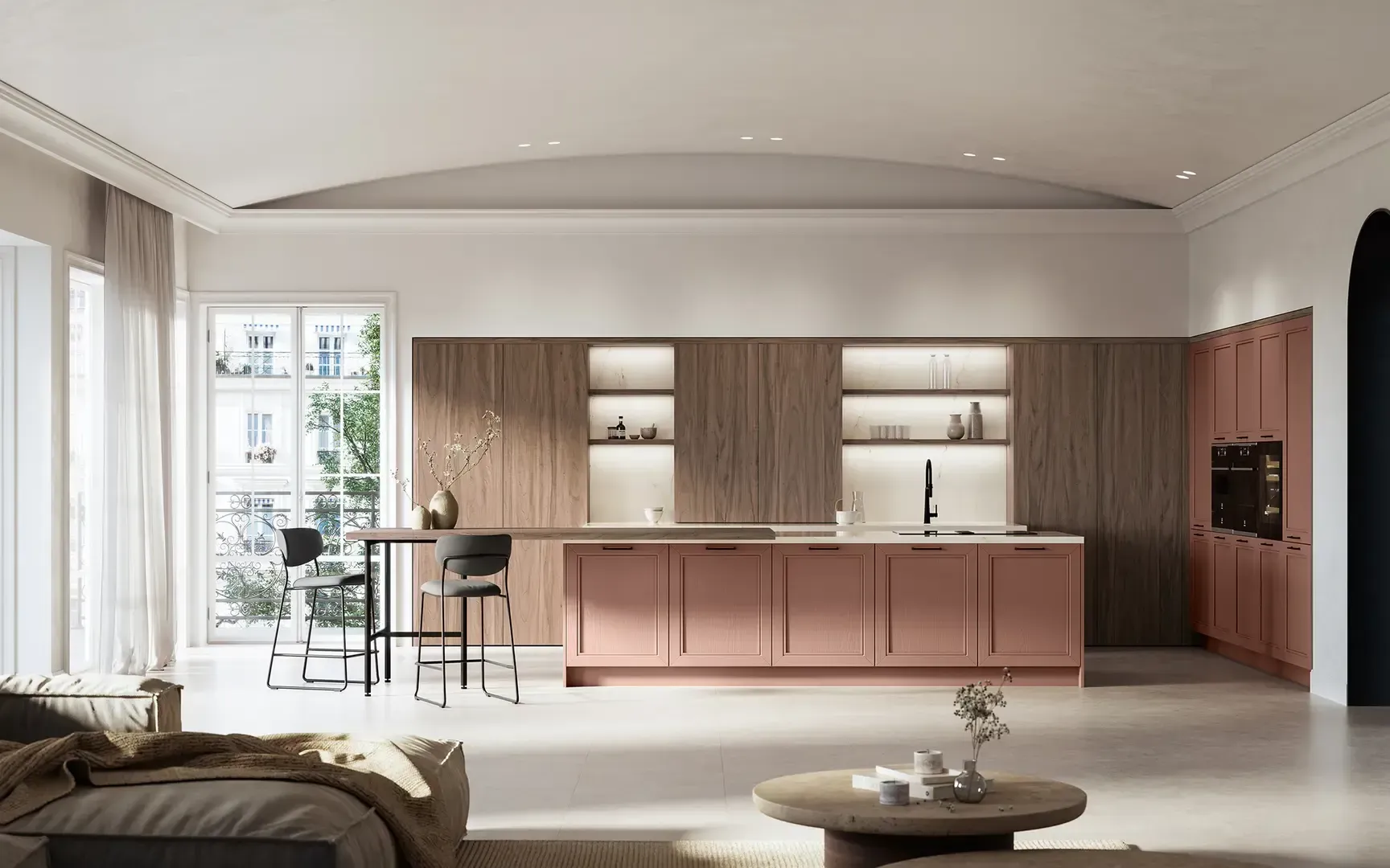 Un soggiorno con divano, tavolo, sedie e cucina.