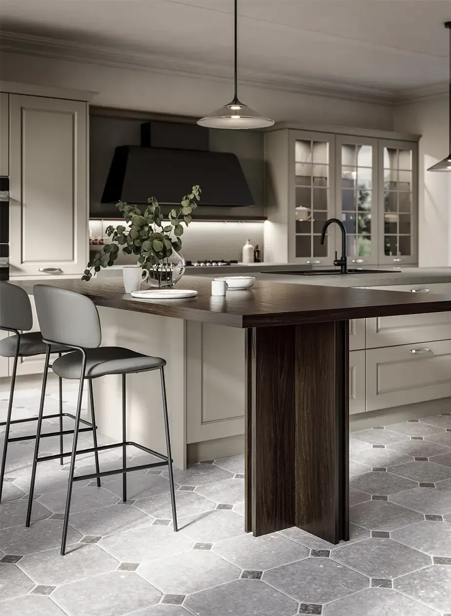 Una cucina con una grande isola e sgabelli