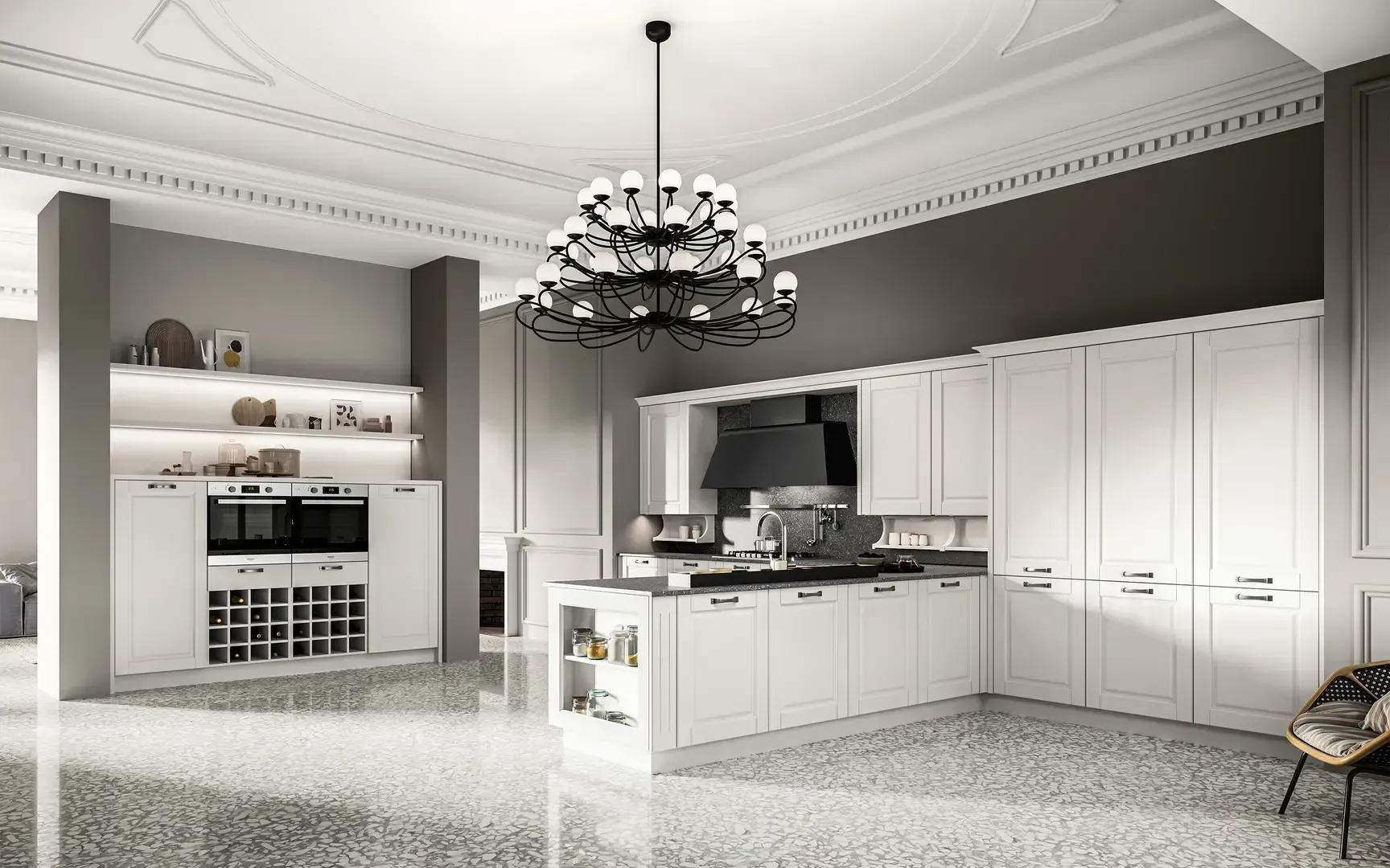 Una cucina con mobili bianchi e un lampadario appeso al soffitto