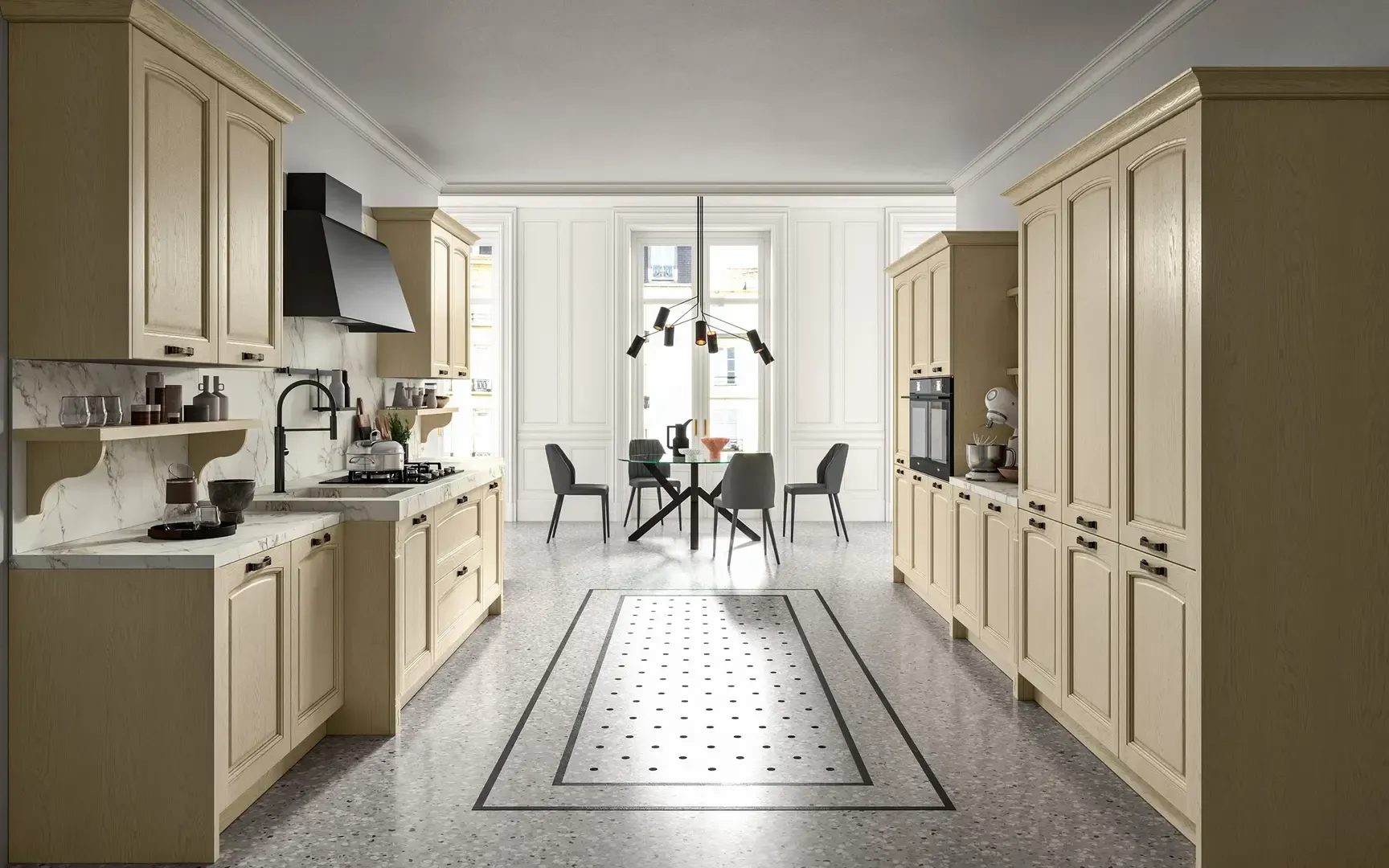 Una cucina con un tavolo e delle sedie al centro.