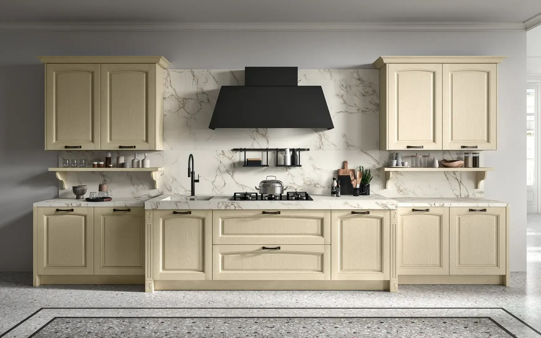 Una cucina con mobili bianchi e una cappa nera