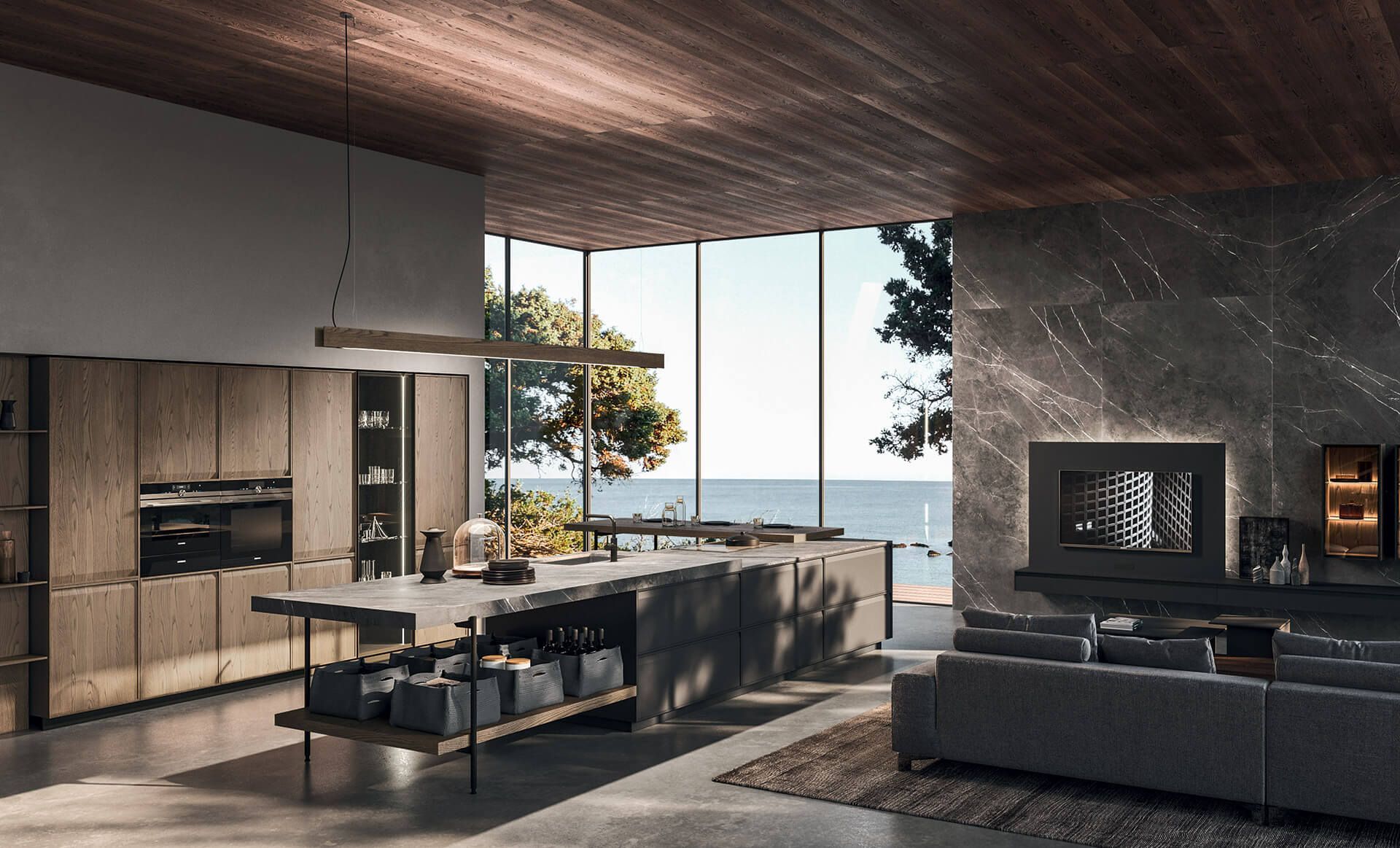 Un soggiorno con una grande finestra che si affaccia sull'oceano