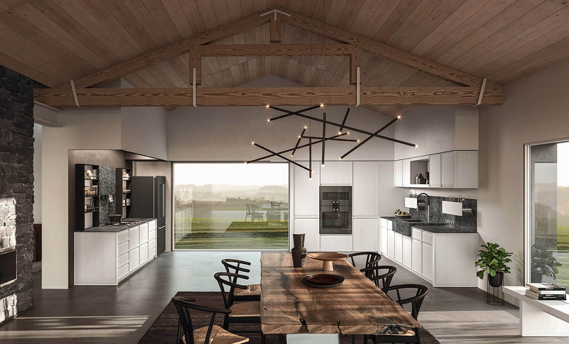 Una cucina con mobili bianchi e un tavolo di legno