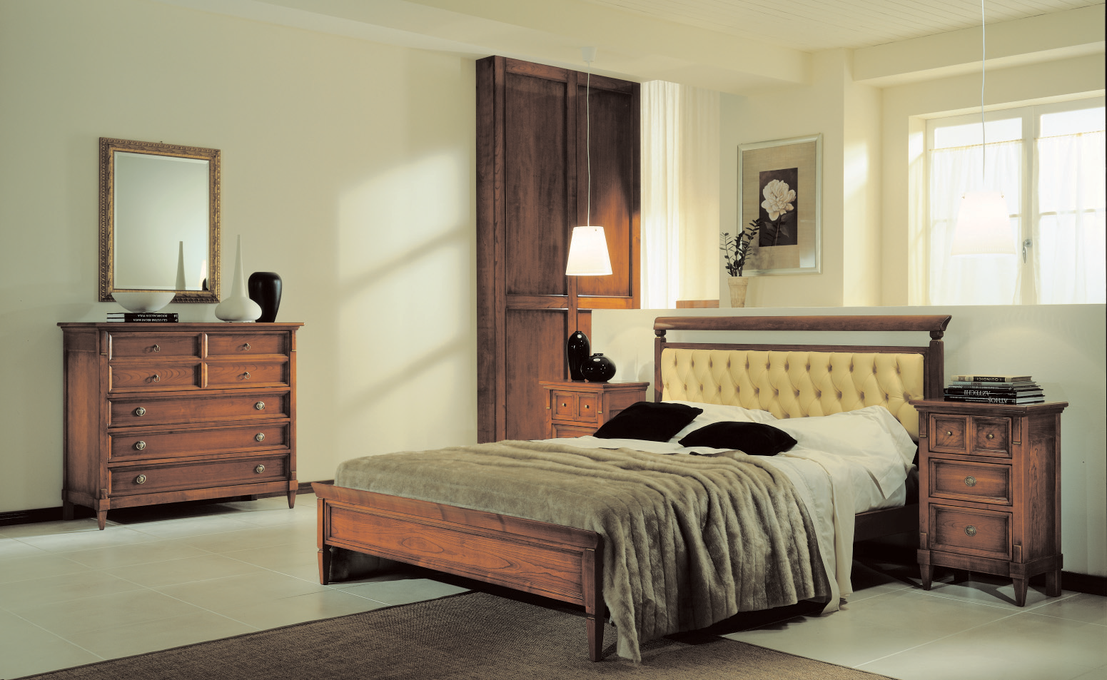 Una camera da letto con un letto, una cassettiera e un comodino