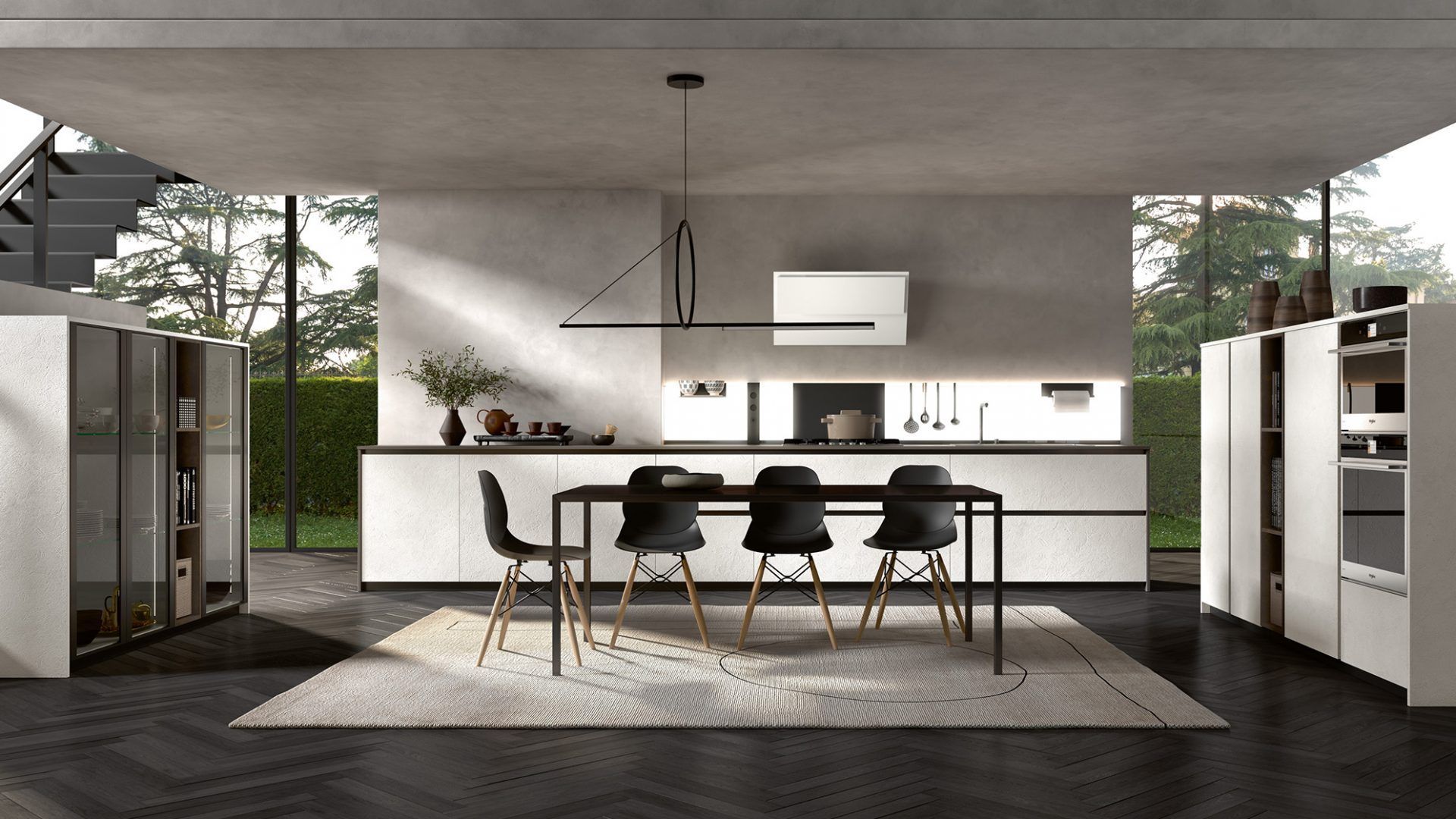 Una cucina con tavolo e sedie