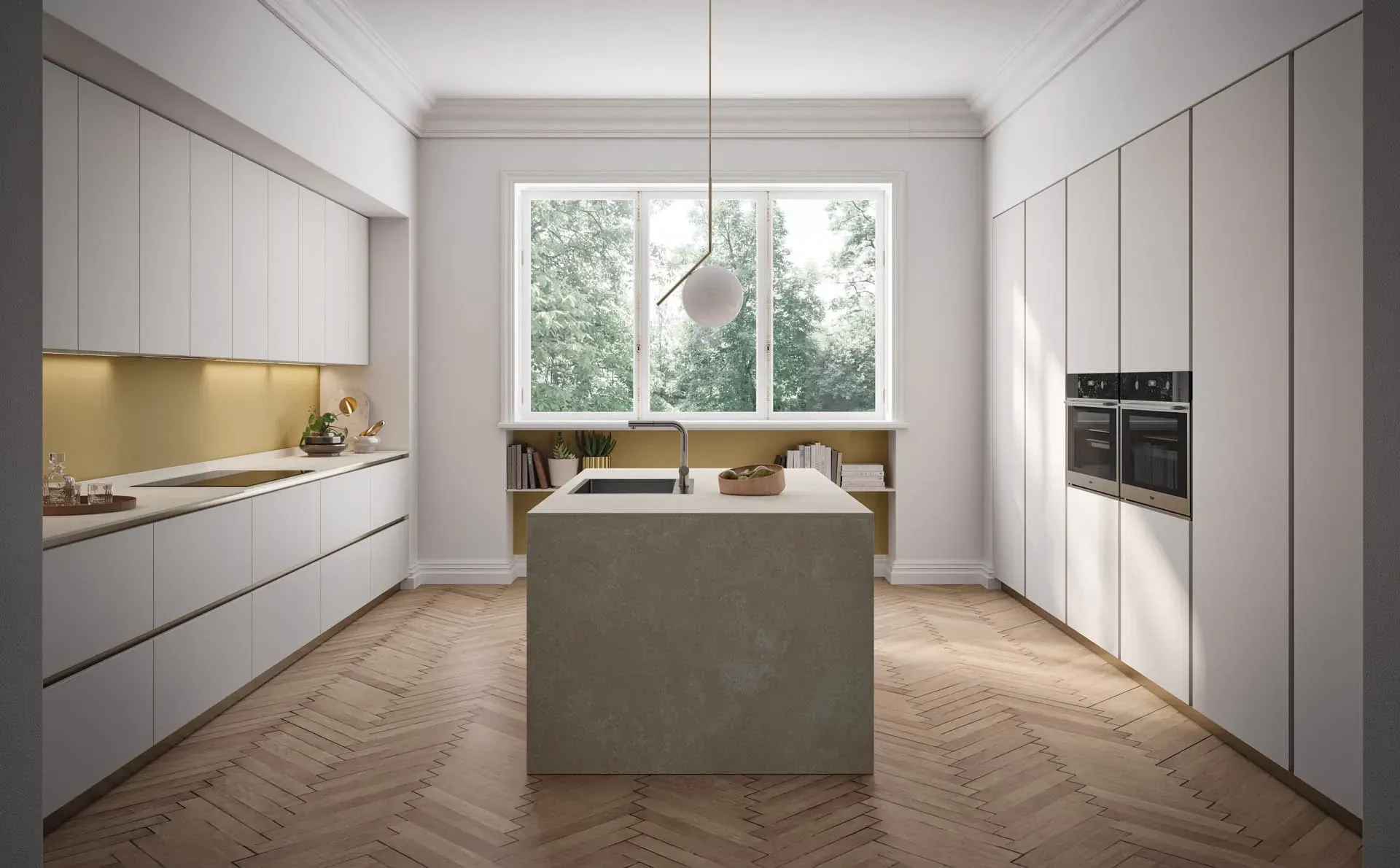 Una cucina con mobili bianchi e una grande isola al centro