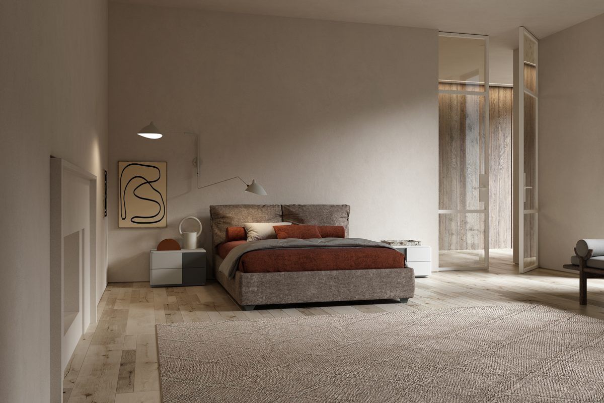 Una camera da letto con un letto grande e un tappeto