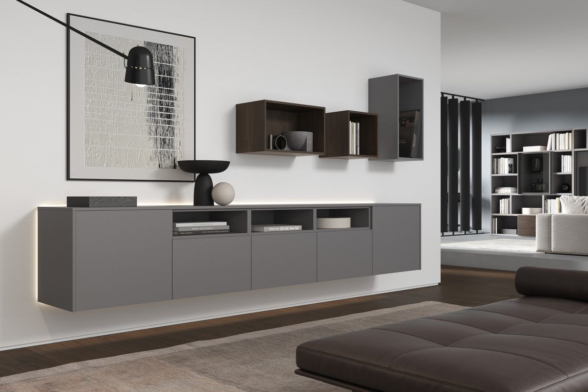 Un soggiorno con un divano e un quadro sul muro