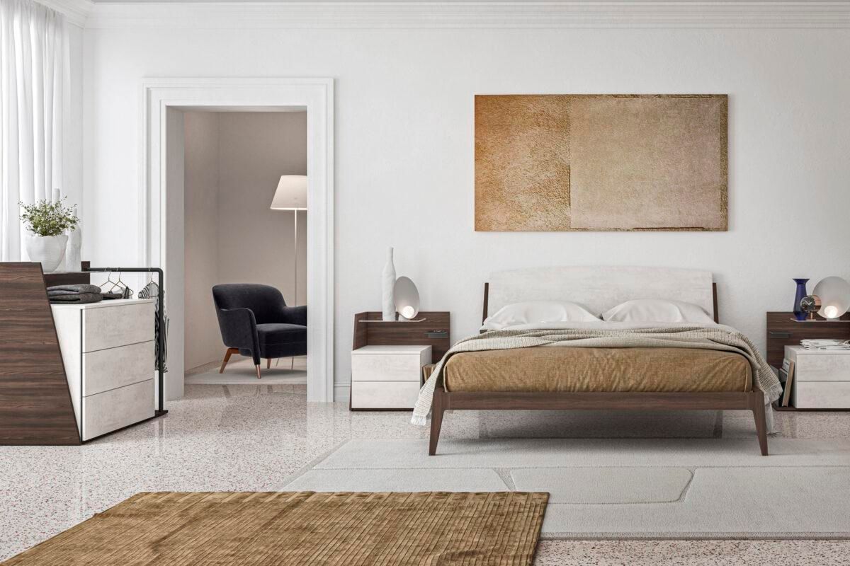 Una camera da letto con un letto grande e un tappeto