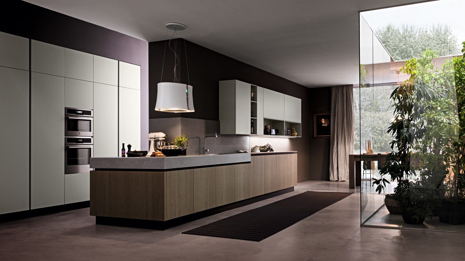 Una cucina moderna con una grande isola al centro