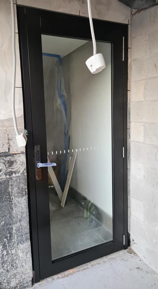 Glass Door in a Shopfront — Quality Custom Screens in Caloundra, QLD
