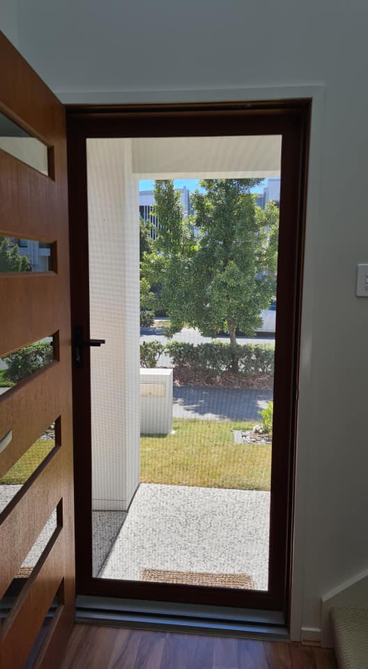 A Brown Door with Screen Door — Quality Custom Screens in Caloundra, QLD