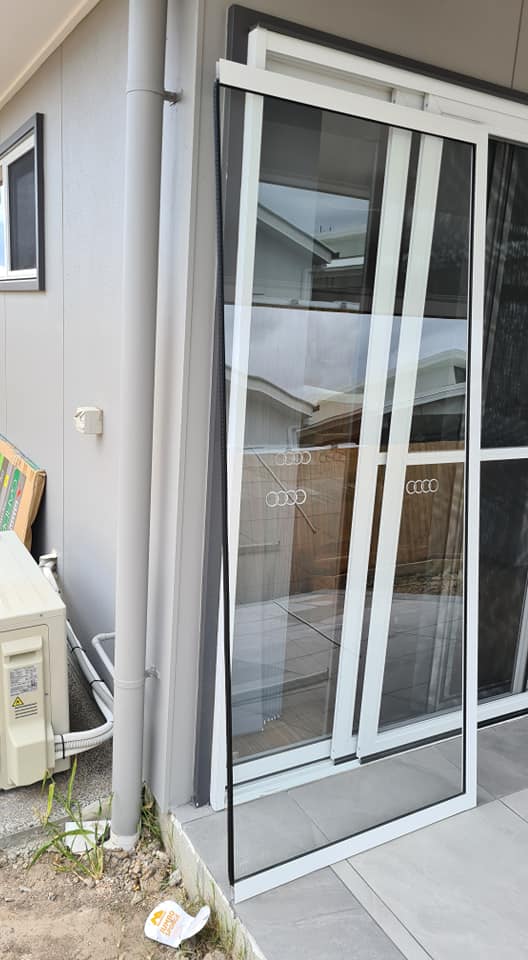 White Glass Door in a Shopfront — Quality Custom Screens in Caloundra, QLD