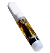 A vape cartridge with a white mouthpiece, containing golden-colored oil, isolated against a white background.
