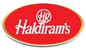 The logo for haldiram 's is a red oval with a gold rim.