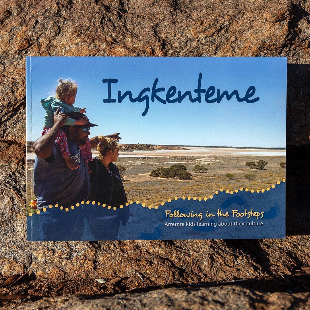 A book titled ingkenteme following in the footsteps