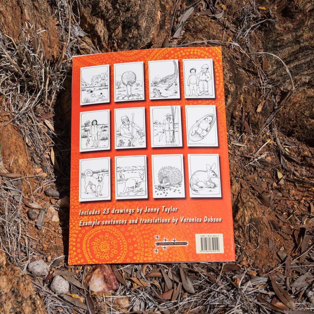 A coloring book with a picture of a cowboy on a horse