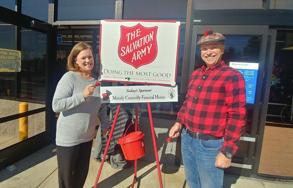 April Miller & John Montieth of Moody-Connolly Funeral Home collecting donations for the Salvation Army