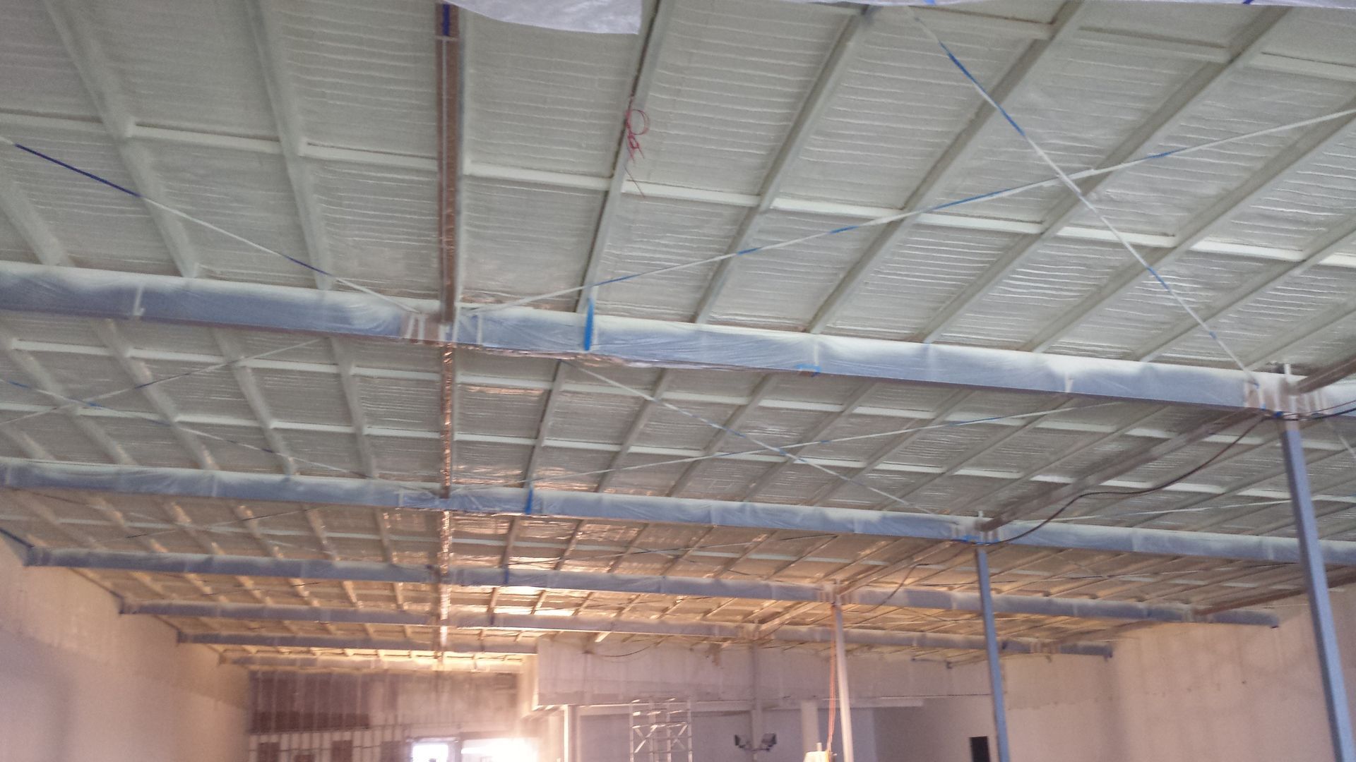 A Man in the Top of Scaffolding | Pakenham, Vic | Advanced Foam & Coatings Pty Ltd