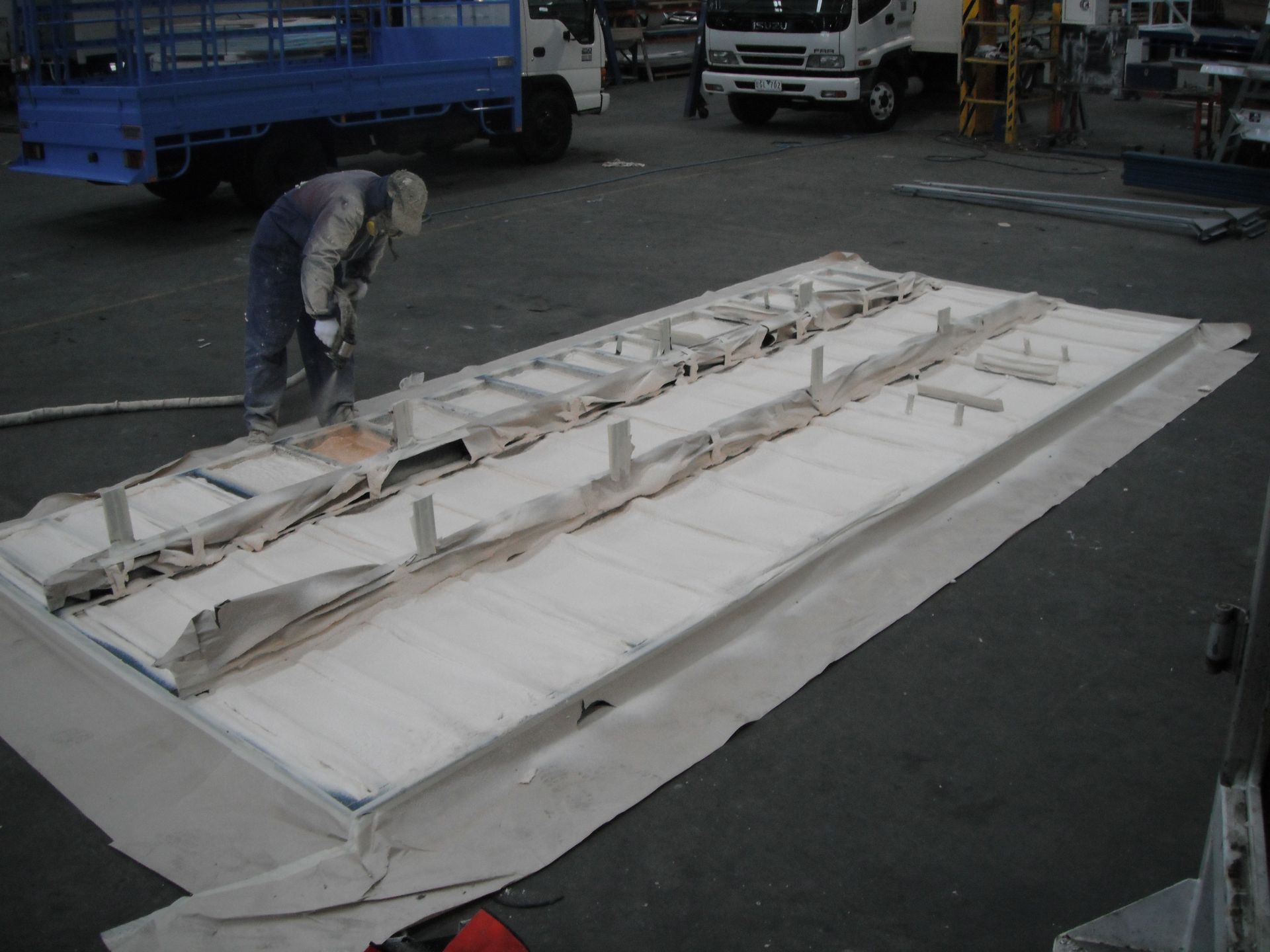 A Worker Spraying a Polyurethane Foam Insulation | Pakenham, Vic | Advanced Foam & Coatings Pty Ltd
