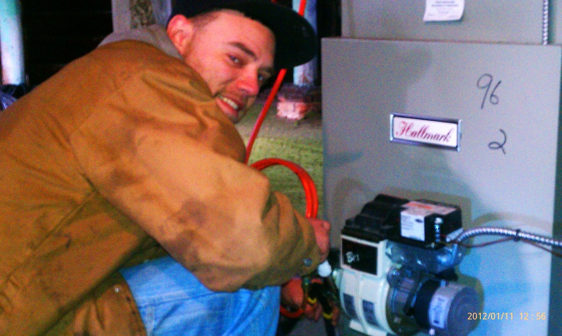 hvac service technician looking happy