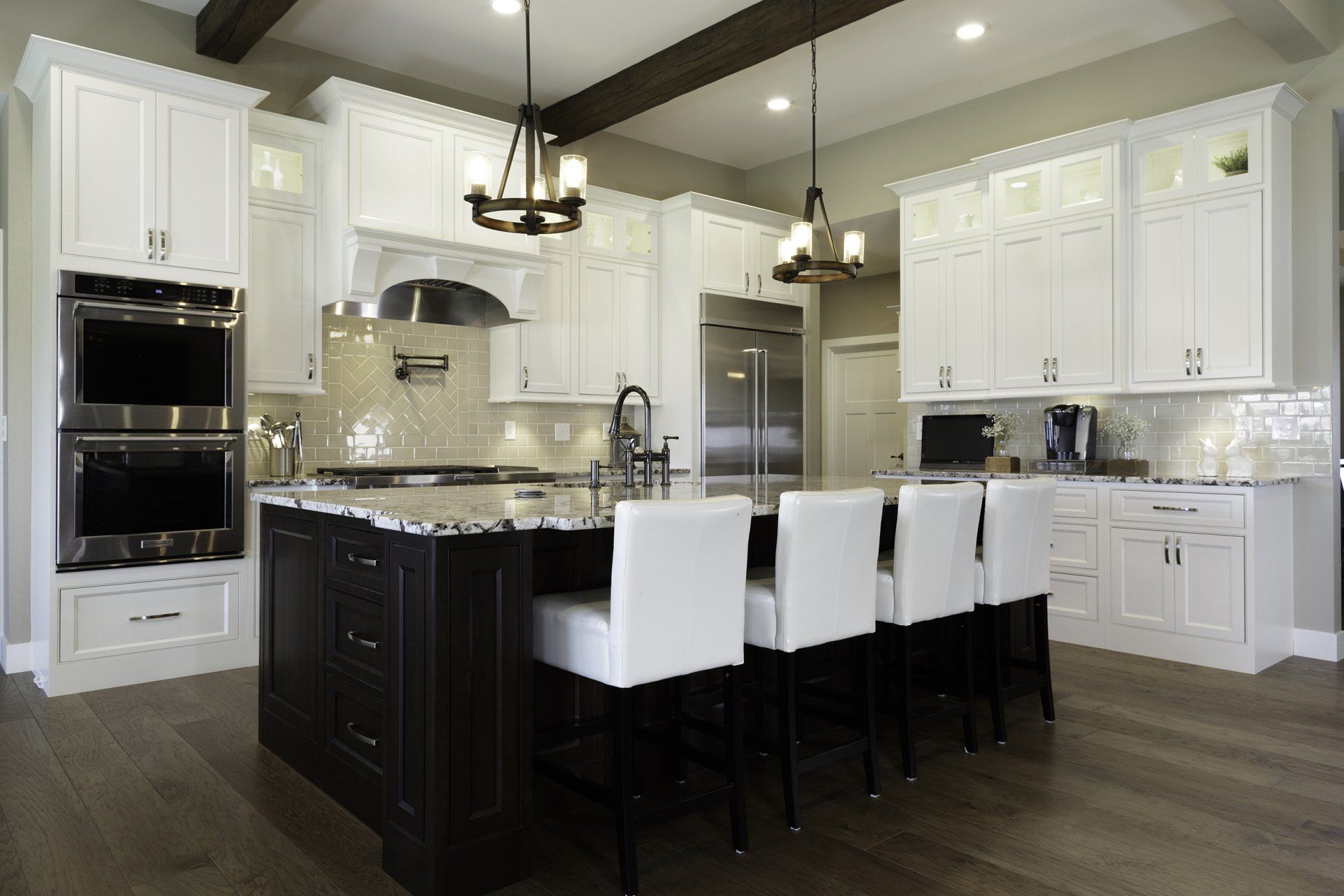 Cabinet Installation — Brown and White Kitchen with Classic Chandelier in Wilmington, DE