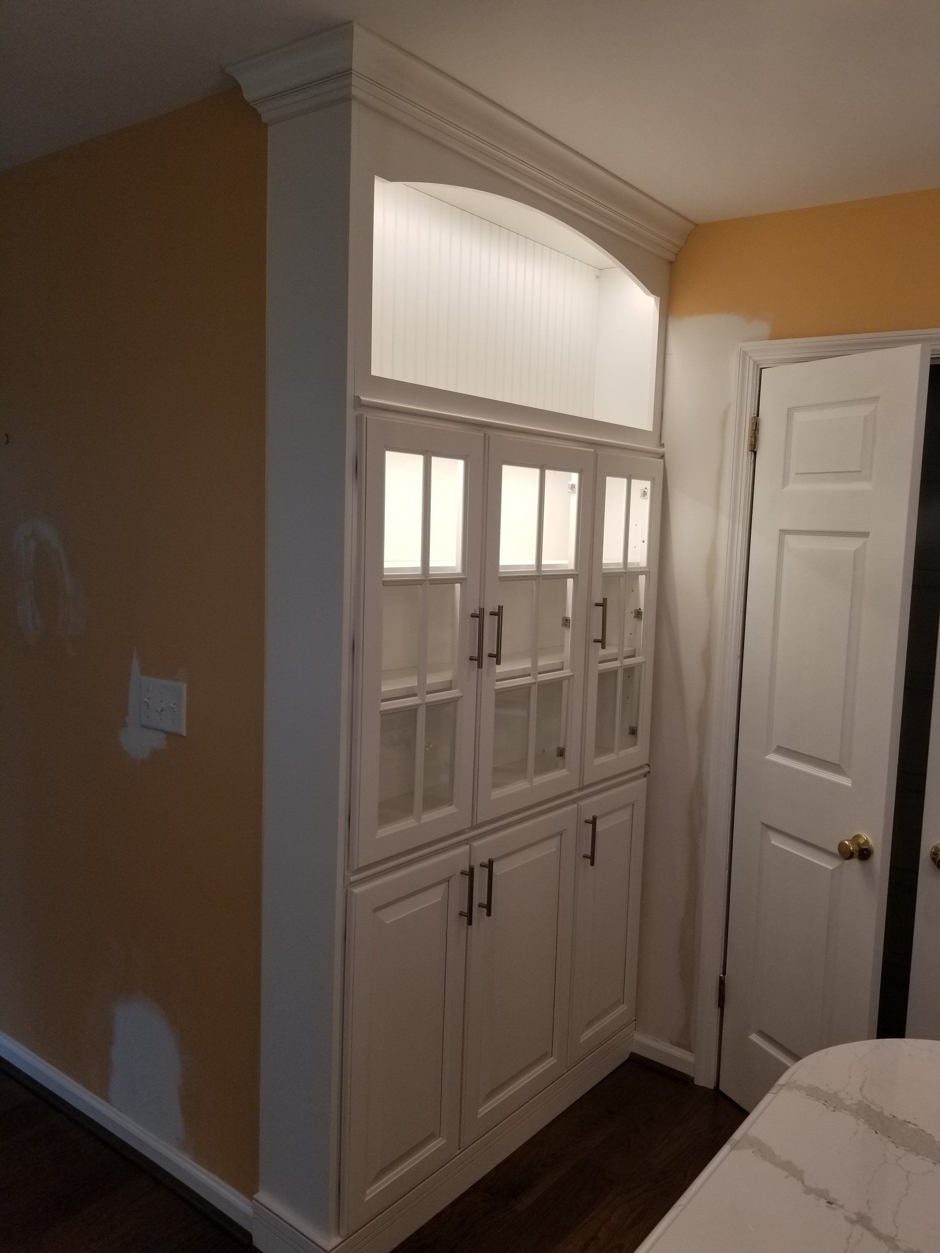 Corian — White Cabinet Near the Door in Wilmington, DE