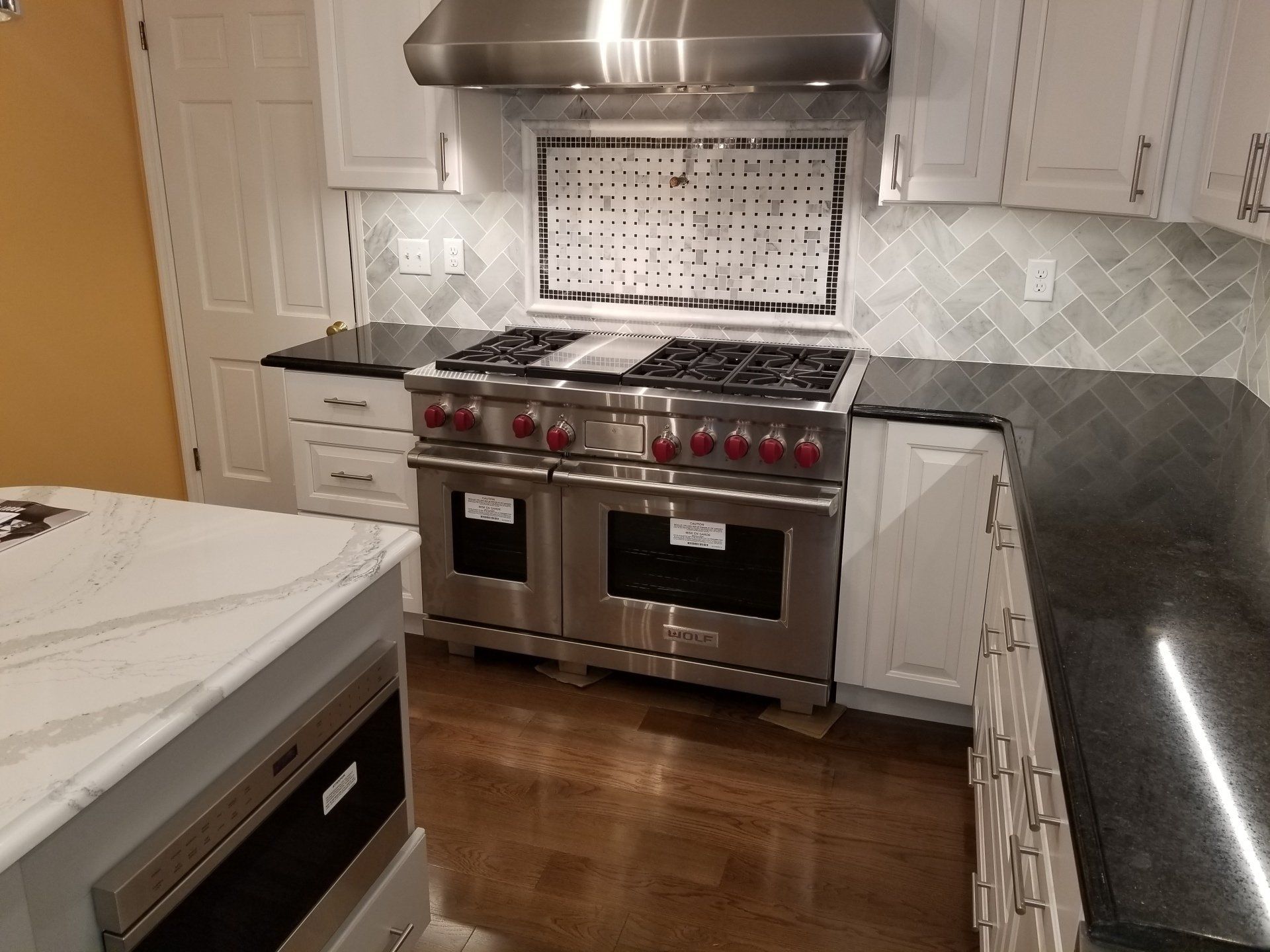 Installs — Black Granite Countertops in White Kitchen in Wilmington, DE