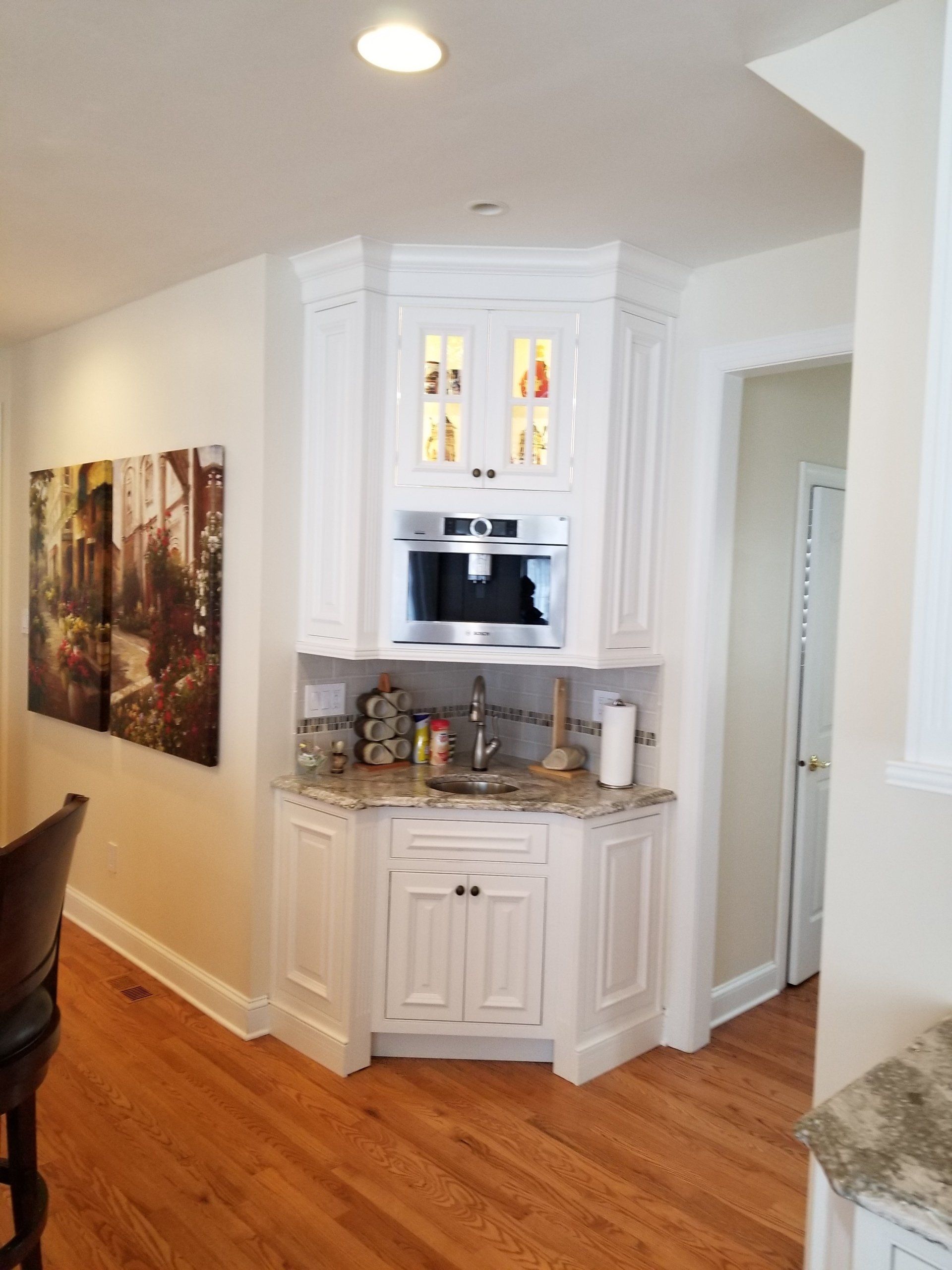 Cabinets — White Cabinet in a Corner of the House in Wilmington, DE