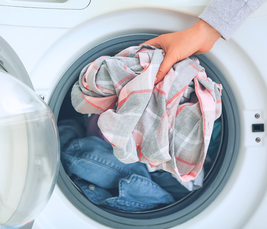 washing machine with clothes inside