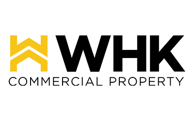 WHK Commercial Property logo in black and gold on a white background