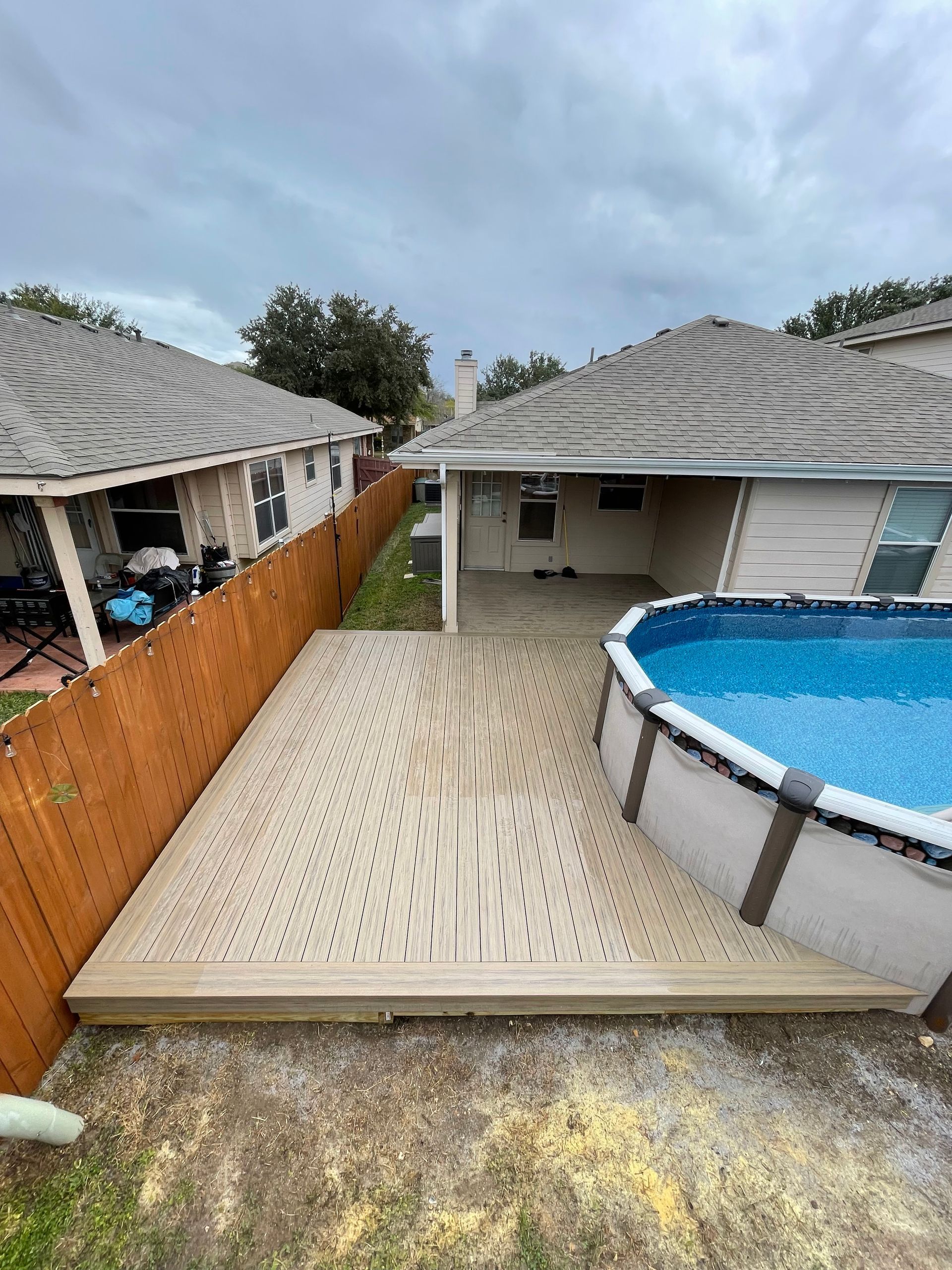 small yard with large deck