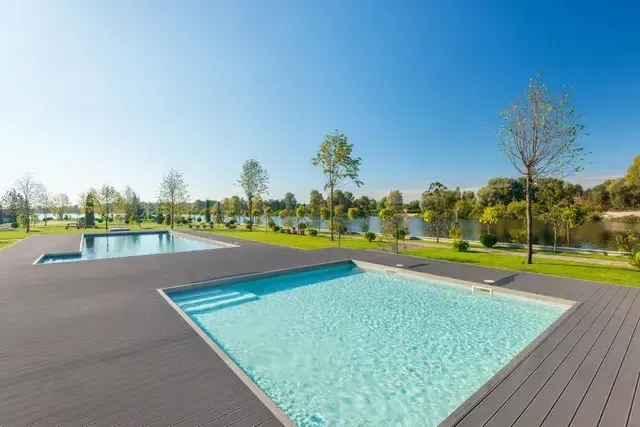 modern swimming pool with composite decking