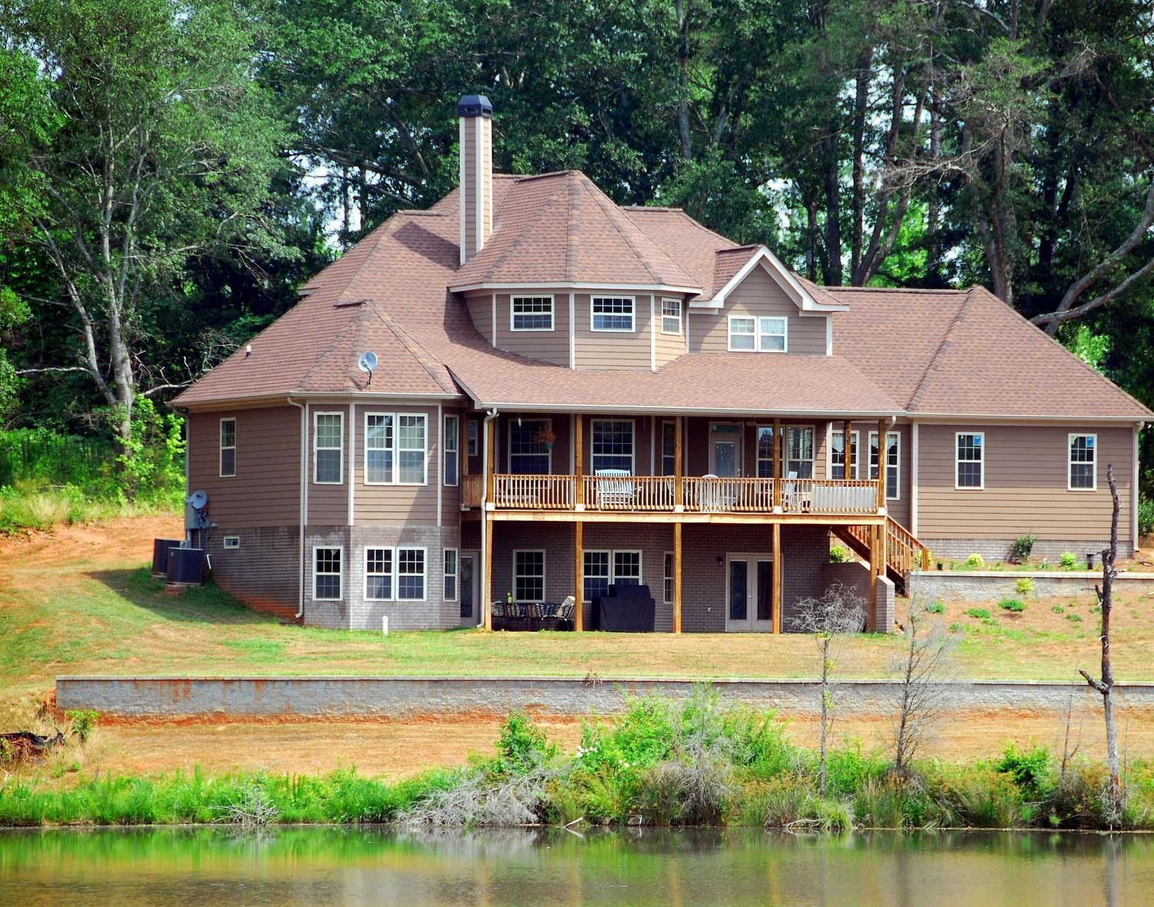 Country home with large attached deck and roof cover Robinson TX