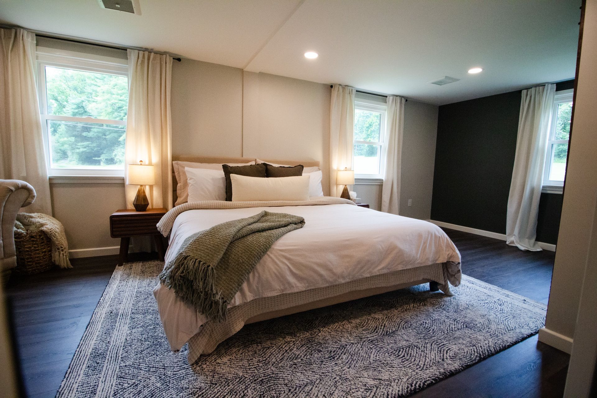 There is a large bed in the middle of the room.