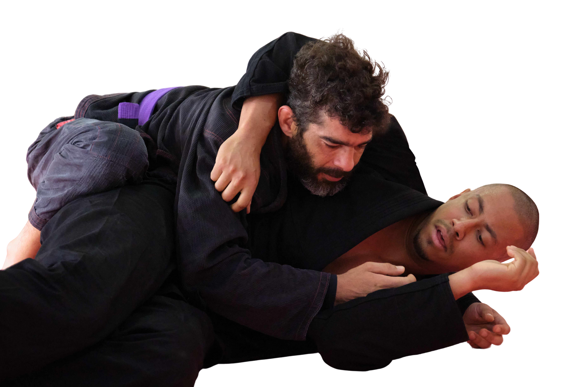 two men are fighting each other in a jiu jitsu match