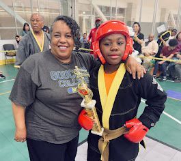 A blurry picture of a bunch of colorful lights on a dark background.