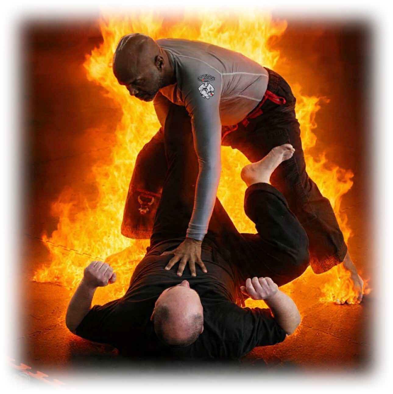 two men are fighting each other in a jiu jitsu match