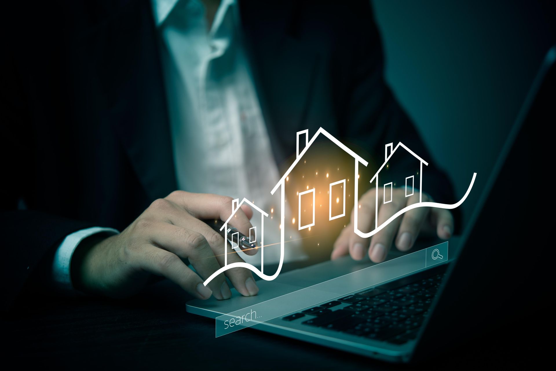 A man is using a laptop computer with a drawing of houses coming out of it.