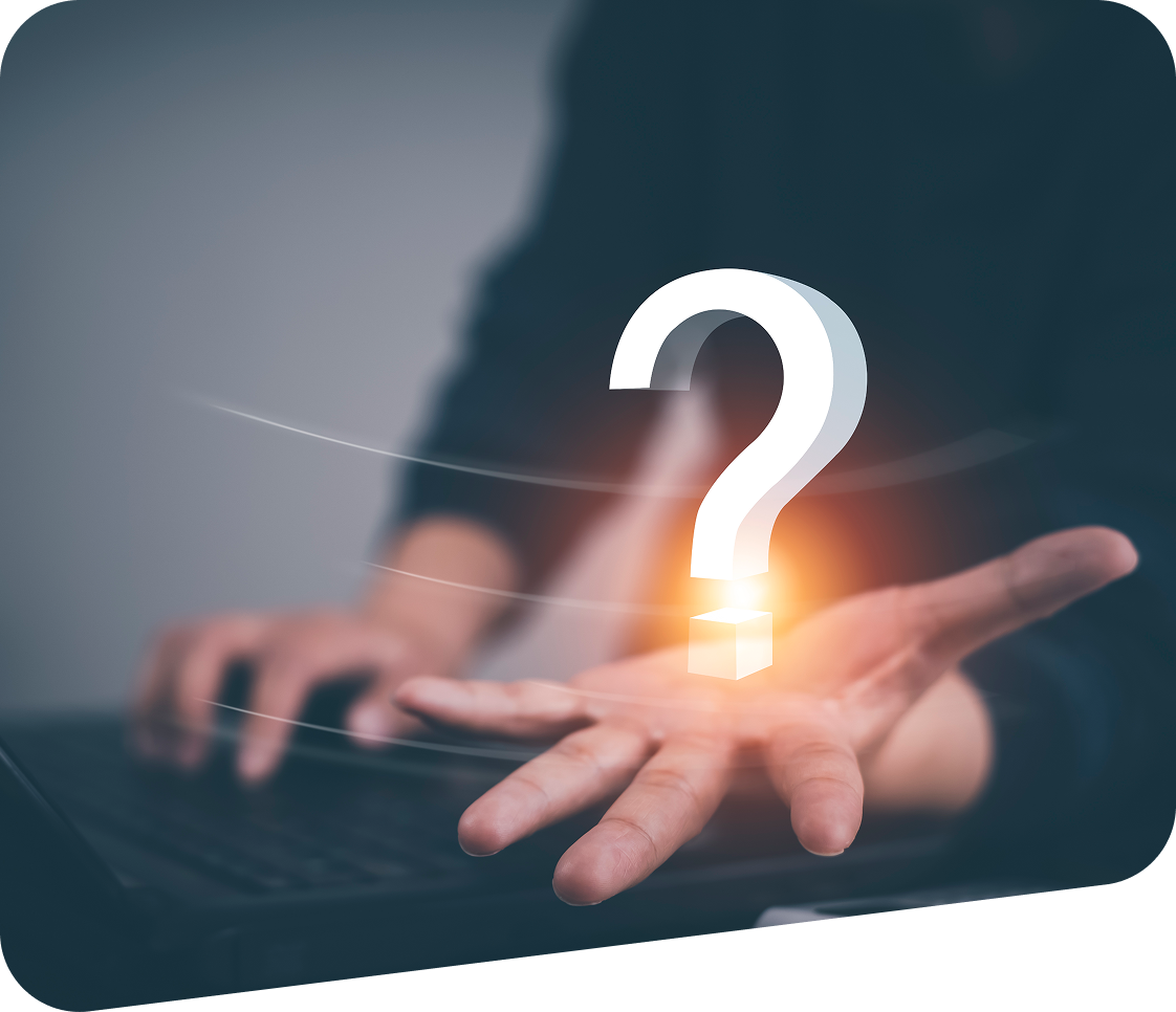 A person holding a question mark in their hand