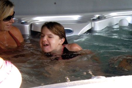 Girl Enjoying in Pool — Burnsville, MN — Valley Pools & Spas