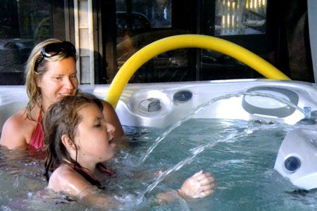 Having Fun in Hot Tub — Burnsville, MN — Valley Pools & Spas