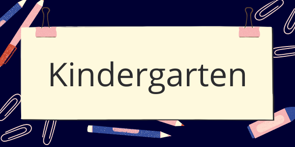 A sign that says kindergarten is surrounded by school supplies.