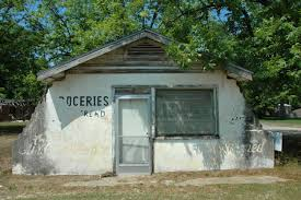 Dilapidated small building with