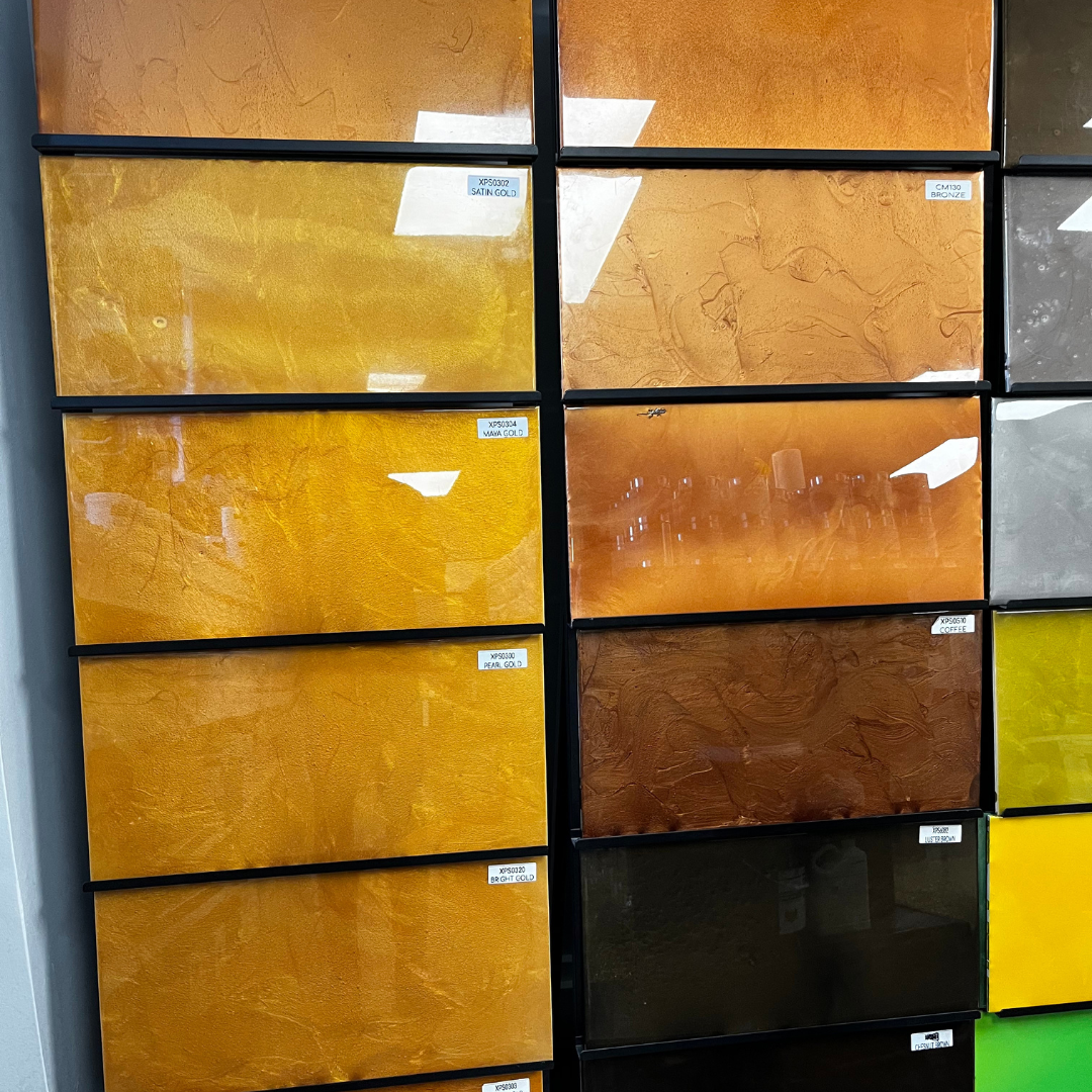 A bunch of different colored tiles are stacked on top of each other