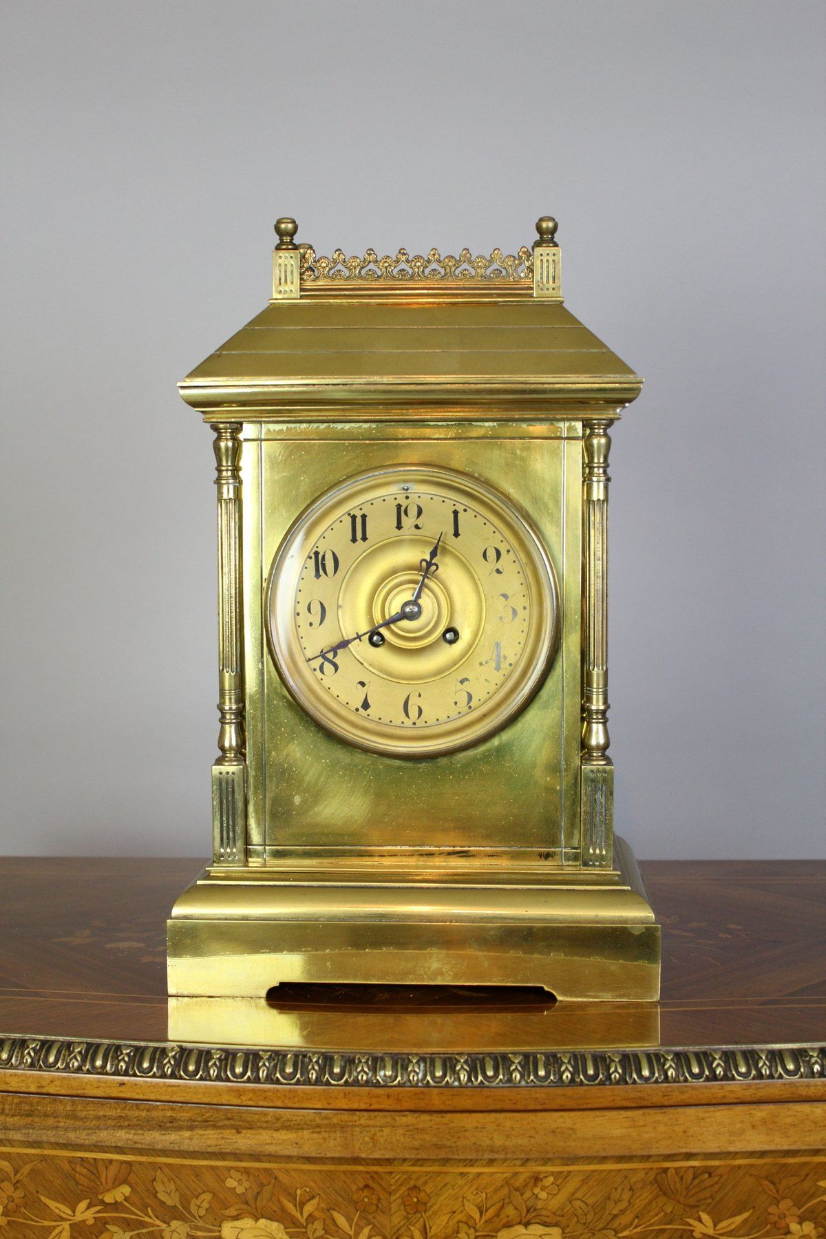 brass mantle clock labelled H Bilton