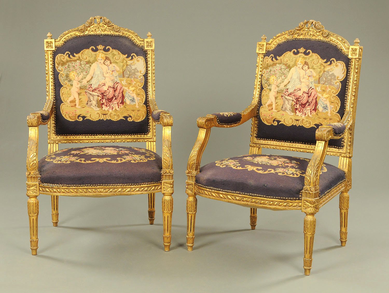 Vintage Chairs Pair of Louis XVI Style Gilt Painted Wooden Tapesry Armchairs