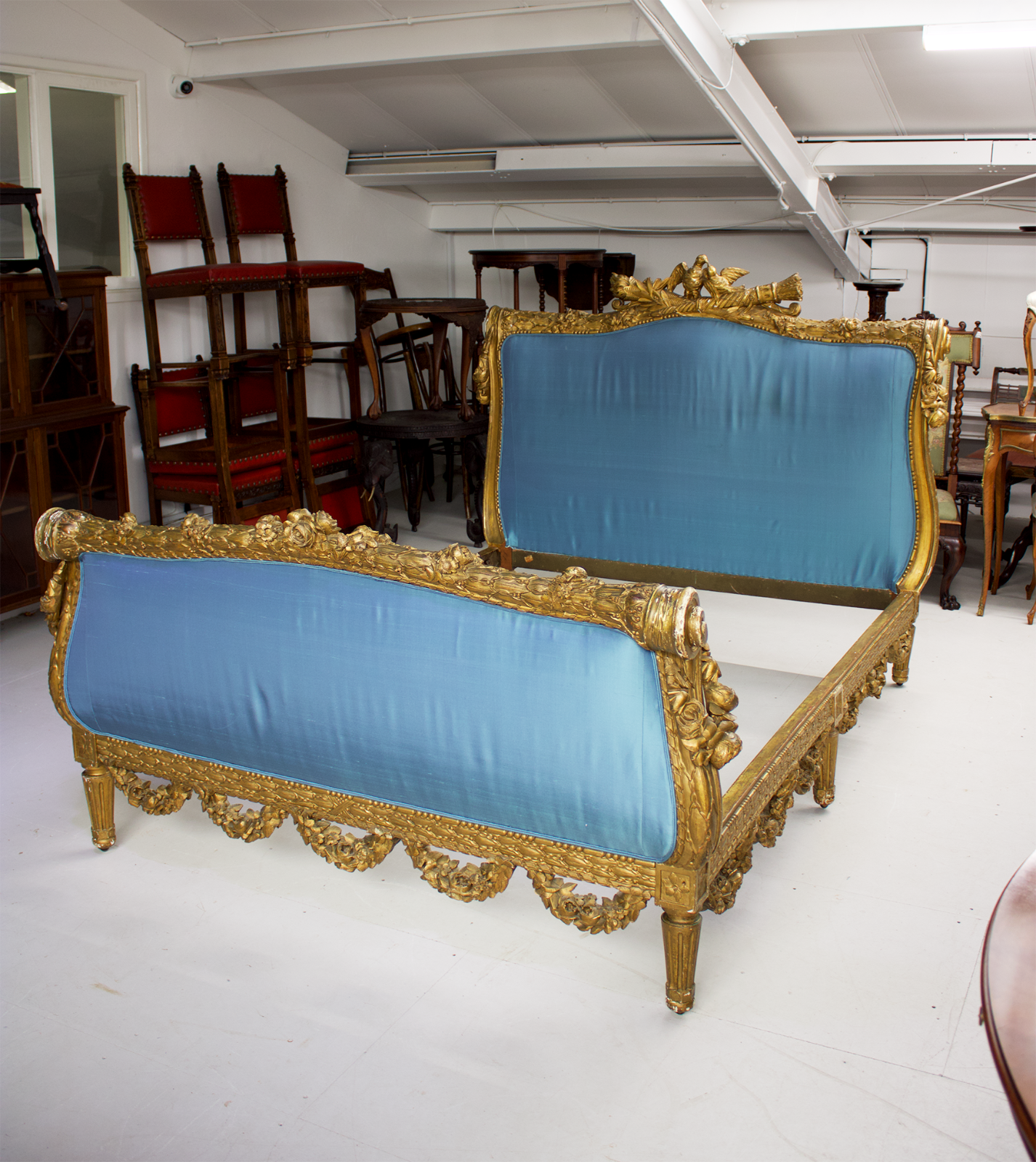 carved giltwood bed
