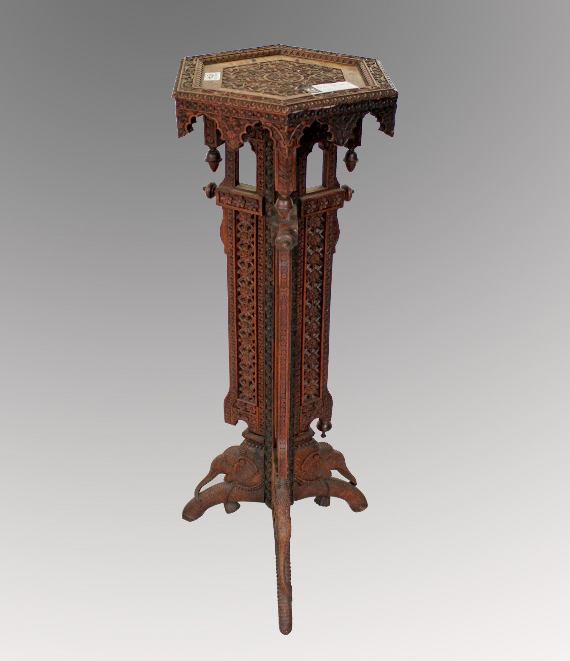 carved oriental stand