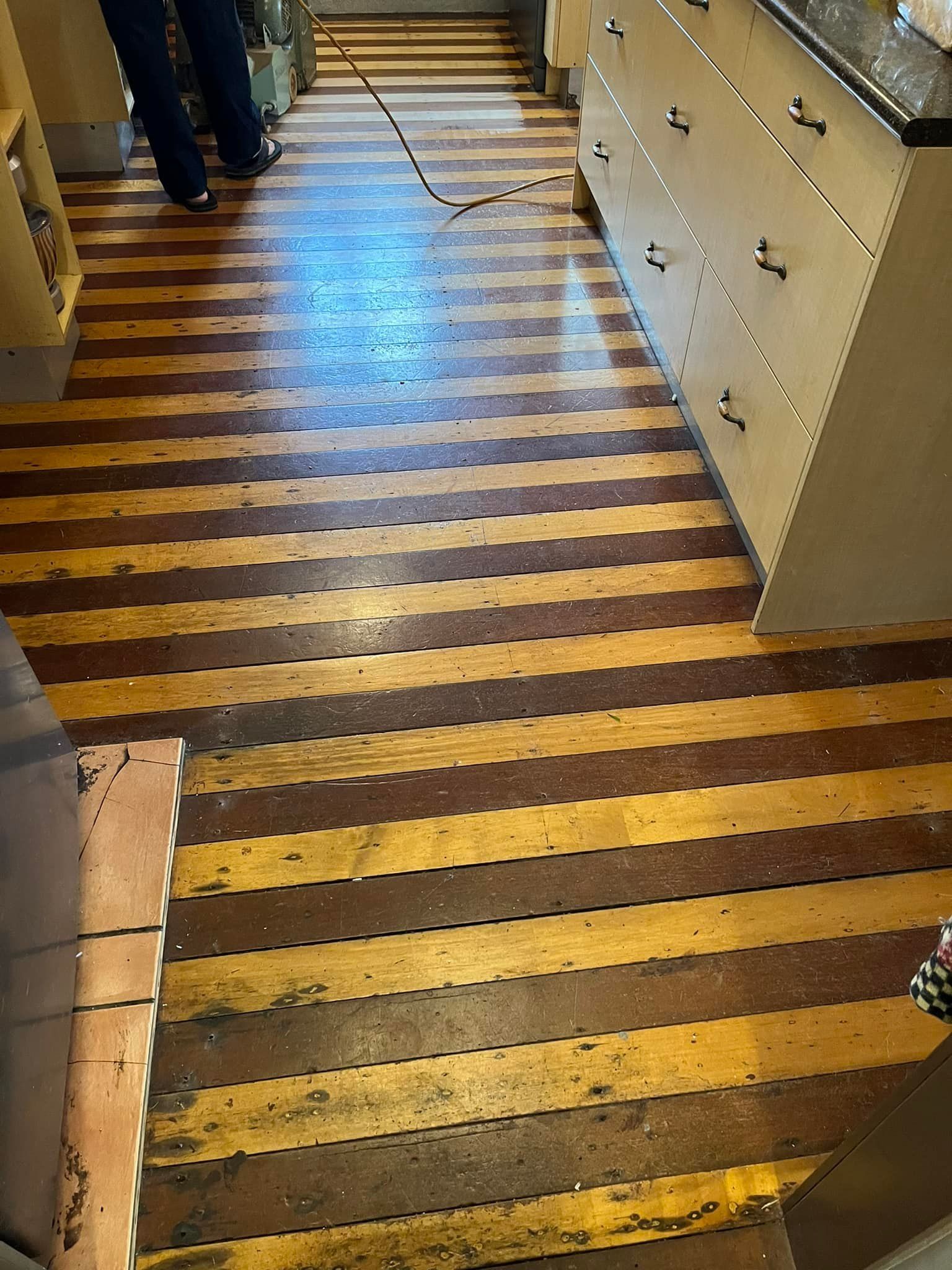 Wooden Floor With Alternating Dark And Light Stripes — Scott Johnston Floor Sanding in Mareeba, QLD